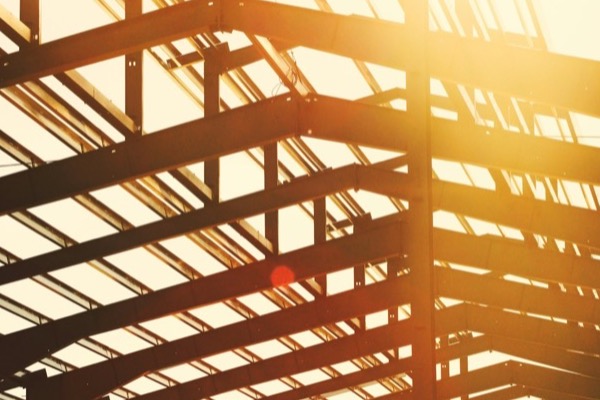 Steel beams forming a building roof structure